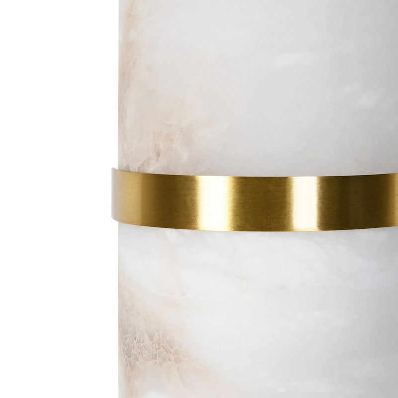 A pale coloured alabaster wall light in an 'art deco' shape with a gilt central band.&nbsp; At 40 cm long, this is a substantial light and would look perfect on a living room wall to add an 'art deco' aesthetic to the room.&nbsp; Wall lights are a fantastic way to add subtle lighting to your room and these alabaster lights are both decorative and effective.
