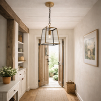 Antique Brass Lantern Light, ideal for porches or halls. Its elegant design suits any style. Perfect as kitchen island trio lighting.