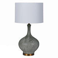Tall, faux, antique shagreen lamp and white shade.&nbsp; A stunning contrast between the dark shagreen colour of the base and the bright white of the shade, a tall imposing lamp that will add glamour and luxury to any room.&nbsp; The whole lamp is set on an antique gold base.&nbsp; The white shade will allow a lot of light to reflect through.&nbsp;&nbsp;

H: 70 cm&nbsp; W: 40 cm