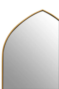Detail of the gold metal framed arched wall mirror