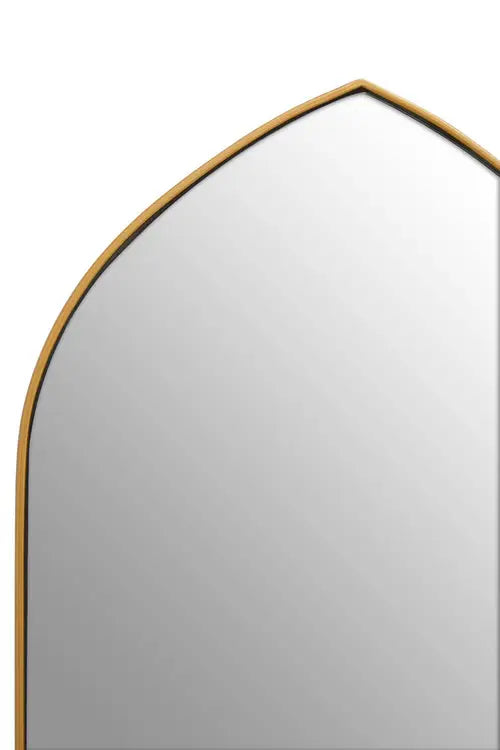 Detail of the gold metal framed arched wall mirror