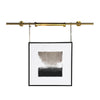 Elevate your artwork or wall décor with this elegant brass picture light, designed for both function and timeless style. Featuring a sleek cylindrical light bar in a warm brass finish, it casts an even, flattering glow across your painting or photograph. The fixture is mounted on a central pole, from which two decorative brass chains extend to secure it to the frame or wall, ensuring both stability and a sophisticated look.

Perfect for galleries, living rooms, or hallways, this brass picture light highligh