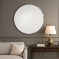 Lift your interior with this Silver Metal Bamboo Effect Round Mirror,  stunning circular  perfect for hallways, bedrooms, or living spaces.
