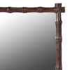 Small resin framed mirror in a faux bamboo style in a bronze resin.&nbsp; Perfect bathroom, small cloakroom or bedroom mirror.&nbsp; Would fit well into any interior, country house or period town home.&nbsp; Compact but interesting with the dark bamboo styled frame.&nbsp; Over a sink, small dressing table or in an alcove this mirror packs a punch for its size and will enliven any area.