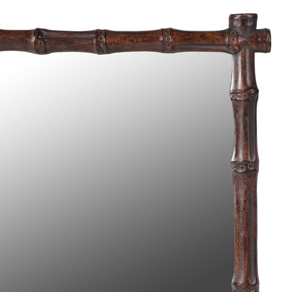 Small resin framed mirror in a faux bamboo style in a bronze resin.&nbsp; Perfect bathroom, small cloakroom or bedroom mirror.&nbsp; Would fit well into any interior, country house or period town home.&nbsp; Compact but interesting with the dark bamboo styled frame.&nbsp; Over a sink, small dressing table or in an alcove this mirror packs a punch for its size and will enliven any area.