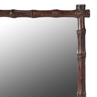Small resin framed mirror in a faux bamboo style in a bronze resin.&nbsp; Perfect bathroom, small cloakroom or bedroom mirror.&nbsp; Would fit well into any interior, country house or period town home.&nbsp; Compact but interesting with the dark bamboo styled frame.&nbsp; Over a sink, small dressing table or in an alcove this mirror packs a punch for its size and will enliven any area.
