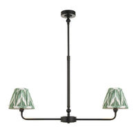 A refined ceiling light featuring an matt black frame with two curved arms, each supporting a classic tapered fabric clip shade.