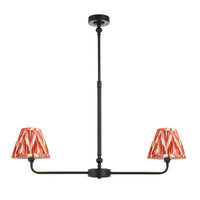 A refined ceiling light featuring an matt black frame with two curved arms, each supporting a classic tapered fabric clip shade.