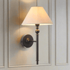 Very simple, classic shaded wall light in matt black metal. The neutral shade is a perfect addition, totally classic. This wall light is a great bedside wall light