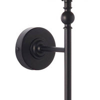 Classic shaded wall light in matt black metal. 