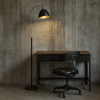 Tall slim profiled, black floor lamp with nickel fittings and gilt inner to the black shade. This lamp is great for a study or to read by, placed by a desk or your favourite chair 