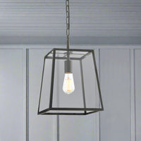 Black trapezoid shaped glass lantern, perfect hall or porch light. It has an industrial twist that suits a period house or the most contemporary interior.