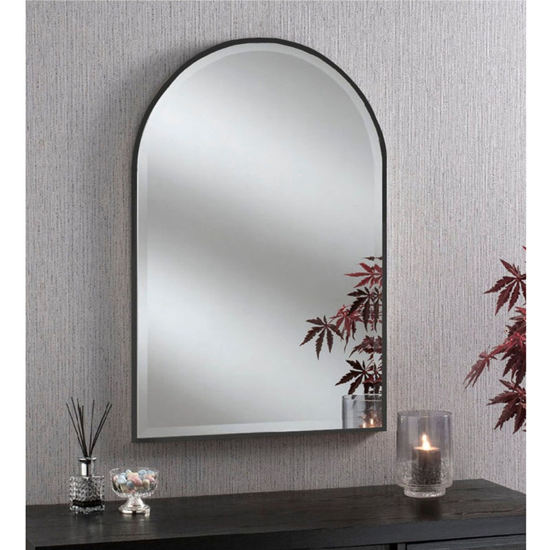 A simple yet stylist thin black framed arch mirror with beveled glass. Minimalist in design. Maximum impact.    H: 93 cm cm W: 63 cm