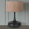 Stunningly simple, contemporary, black wooden lamp base with round jute shade. A statement lamp, alone or as a pair in your open interior.&nbsp; Scandi design dream.


H: 57 cm W: 36 cm