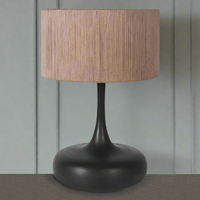 Stunningly simple, contemporary, black wooden lamp base with round jute shade. A statement lamp, alone or as a pair in your open interior.&nbsp; Scandi design dream.


H: 57 cm W: 36 cm