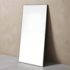 A simple and highly effective mirror minimalist in design yet maximum in impact.&nbsp; With a super slim wooden black frame that is 2cm in depth, the striking thing about this mirror is the sheer volume of glass that reflects and bounces light back into your room.&nbsp; Made in the UK, this mirror is worth the wait.&nbsp; Also available in Gold.