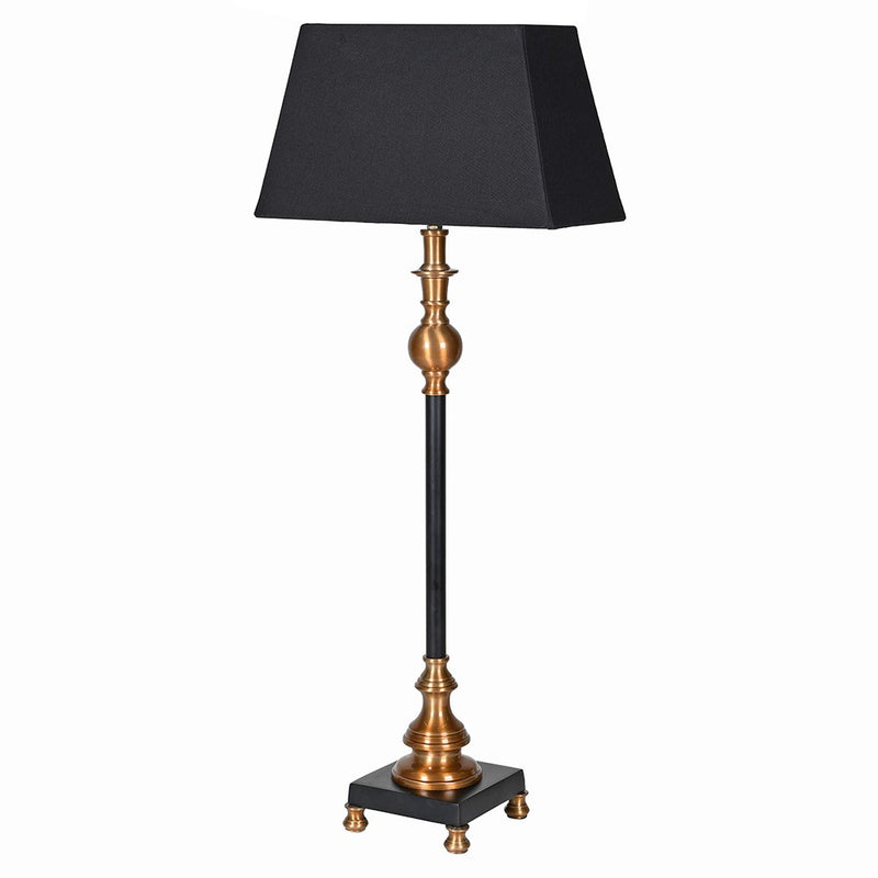Bring timeless sophistication into your home with this tall black and gilt lamp, designed to make a statement in any room. Featuring a sleek black base accented with warm antique gold detailing, this lamp perfectly balances modern elegance with traditional charm. The structured black shade softens the glow, creating ambient lighting ideal for living rooms, bedrooms, or entryways.

Crafted for both style and function, this decorative table lamp adds height, drama, and a touch of luxury to side tables, consol