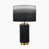 Ceramic black and gold lamp base in a striking black with gold accents.&nbsp; The lamp is topped with a very unusual ombre lampshade toning from black to grey.