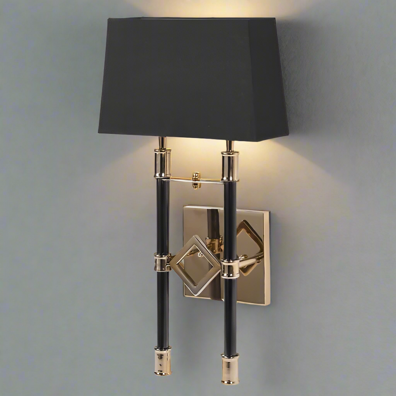 Double wall light on a polished gilt metal frame. Long black and gilt bulb holders with a wide black shade on the top. A dramatic effect on any wall. perfect sitting room, dining room or hall lighting.