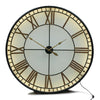 This is an indoor clock where the hands are operated by two standard AA batteries.&nbsp; The iron fascia and hands sit on top of a smoked glass.&nbsp; The batteries are housed in the middle behind the hands - the cross section of which can be pulled out for access.&nbsp;  An led strip light inside requires a power / three pin plug socket.&nbsp;