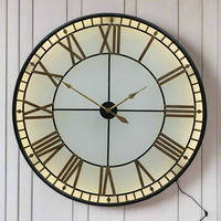 Available in two sizes 80cm and 120cm.&nbsp; Depth 14cm.


This is an indoor clock where the hands are operated by two standard AA batteries.&nbsp; The iron fascia and hands sit on top of a smoked glass.&nbsp; The batteries are housed in the middle behind the hands - the cross section of which can be pulled out for access.&nbsp;

An led strip light inside requires a power / three pin plug socket.&nbsp;