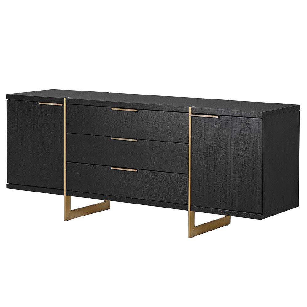 A stunning, black sideboard with two doors and 3 central drawers. This piece appears to float on two rectangular gilt plinths that hold the sideboard. Super stylish, contemporary item of furniture that will definitely stand out in any room. The contrast of the dark wood and the brushed git metal handles and door pul