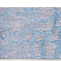 A contemporary blue and grey rug designed to add subtle texture and calm colour to your space. 