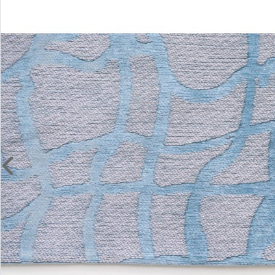 A contemporary blue and grey rug designed to add subtle texture and calm colour to your space. 