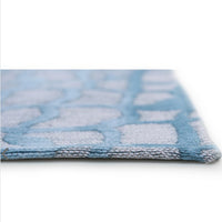 A contemporary blue and grey rug designed to add subtle texture and calm colour to your space. 
