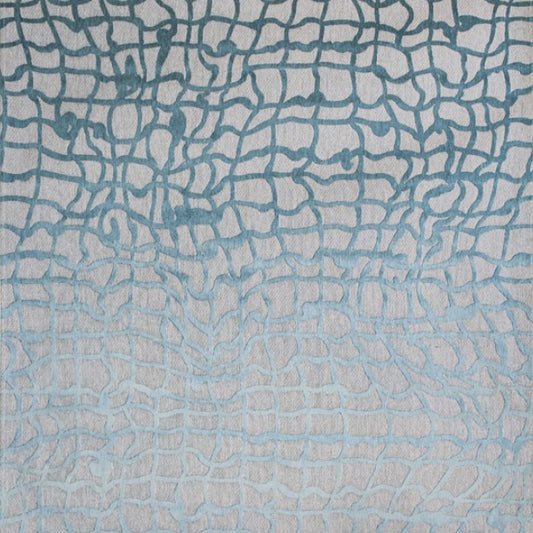 A contemporary blue and grey rug designed to add subtle texture and calm colour to your space. 