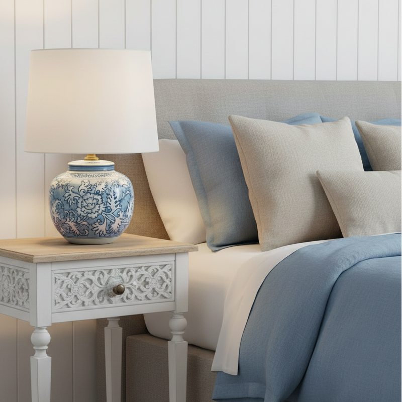 A really pretty smaller blue and white round based ceramic lamp with white shade. Perfect size for a smaller space, or a bedside lamp.