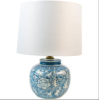 A really pretty smaller blue and white round based ceramic lamp with white shade. Perfect size for a smaller space, or a bedside lamp.