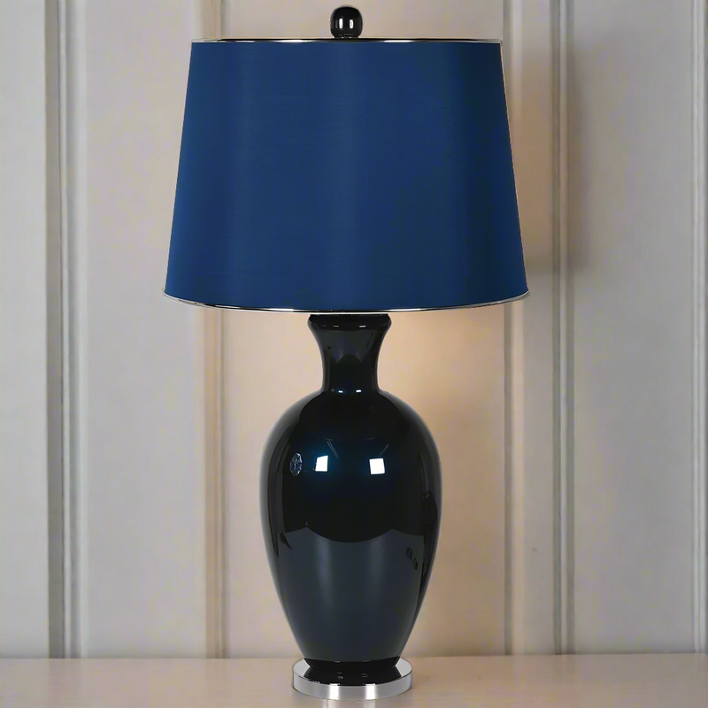 A really deep, jeweled coloured lamp base with a matching blue shade, an absolutely beautiful colour to add to any interior. Perfect for a hall console table, a great way to add colour and interest to any space.


H:&nbsp; 85 cm W:&nbsp; 45cm.