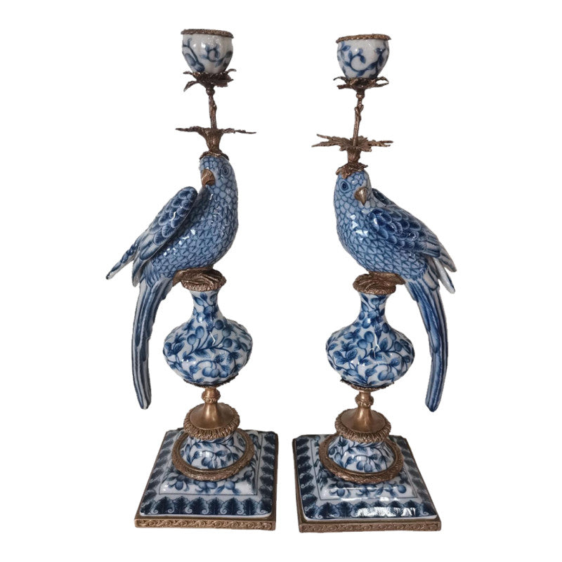 Stunning blue and white porcelain candleholders with bronze finials. Exceptional quality, a real statement in any room. These candlesticks are sold as a pair. 