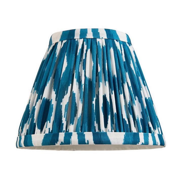 16cm tapered shade with a clip to fit golf or candle bulbs. Unique Ikat pattern design in blue &amp; white with tapered edge detailing.
Perfect when paired with decorative table lights, wall lights or chandeliers.