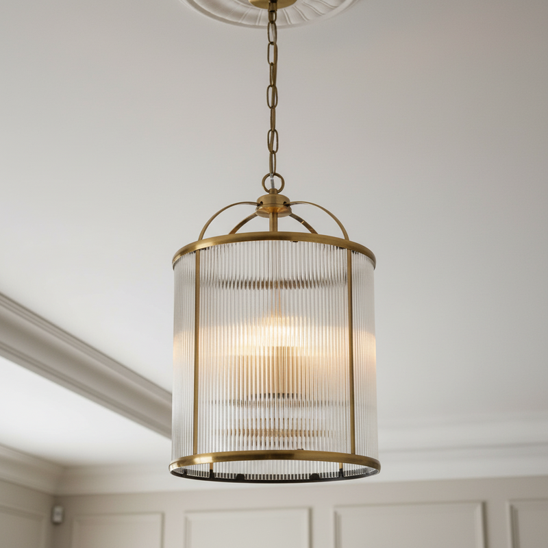 Brass metal lantern with ribbed glass, perfect hall or stair light. A classic shaped lantern unusually with ribbed glass which adds a muted effect to the light.