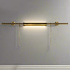 Elevate your artwork or wall décor with this elegant brass picture light, designed for both function and timeless style. Featuring a sleek cylindrical light bar in a warm brass finish, it casts an even, flattering glow across your painting or photograph. The fixture is mounted on a central pole, from which two decorative brass chains extend to secure it to the frame or wall, ensuring both stability and a sophisticated look.

Perfect for galleries, living rooms, or hallways, this brass picture light highligh