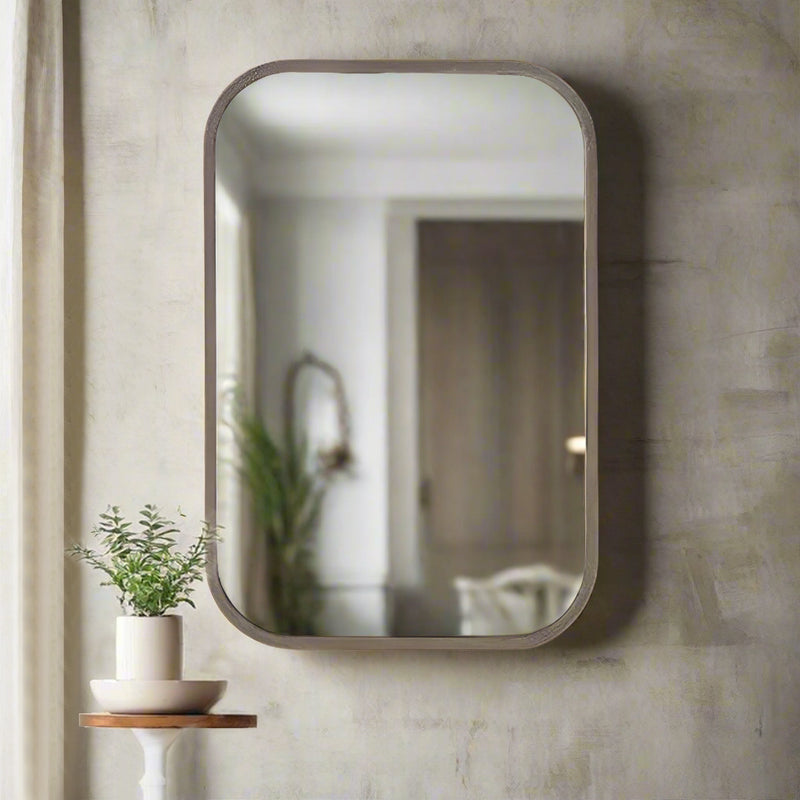 Bronzed metal wall mirror with curved corners ,perfect minimalist frame for optimum light reflection. Great bathroom mirror, the curved edges allow the mirror to be hung vertically or horizontally.