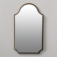 The perfect compact mirror, great for cloakroom or small bedroom, very pretty shape with beveled edges to spread light. The bronze metal frame will work with so many interiors.