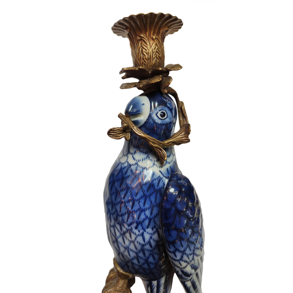 An absolutely stunning pair of bronze and porcelain parrot wall candle sconces.&nbsp; These are part of our heirloom range of bronze and porcelain.&nbsp; Exquisite quality, made to last forever. These unusual wall candle holders will add a touch of luxury to your home, placed either side of an overmantle mirror above a fire place or one above the other on a side wall.&nbsp;