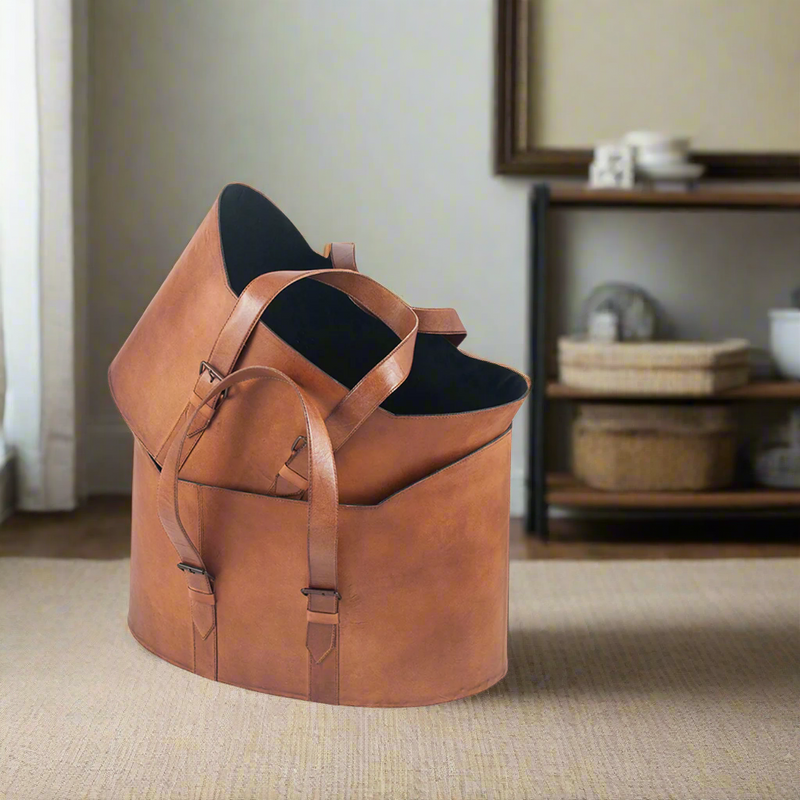 Brown storage baskets with handles that can be purchased as a set of two or individually.&nbsp; These leather baskets are a good styling storage solution for any room.

They can be purchased individually or as a set of two consisting of one large basket and medium basket.