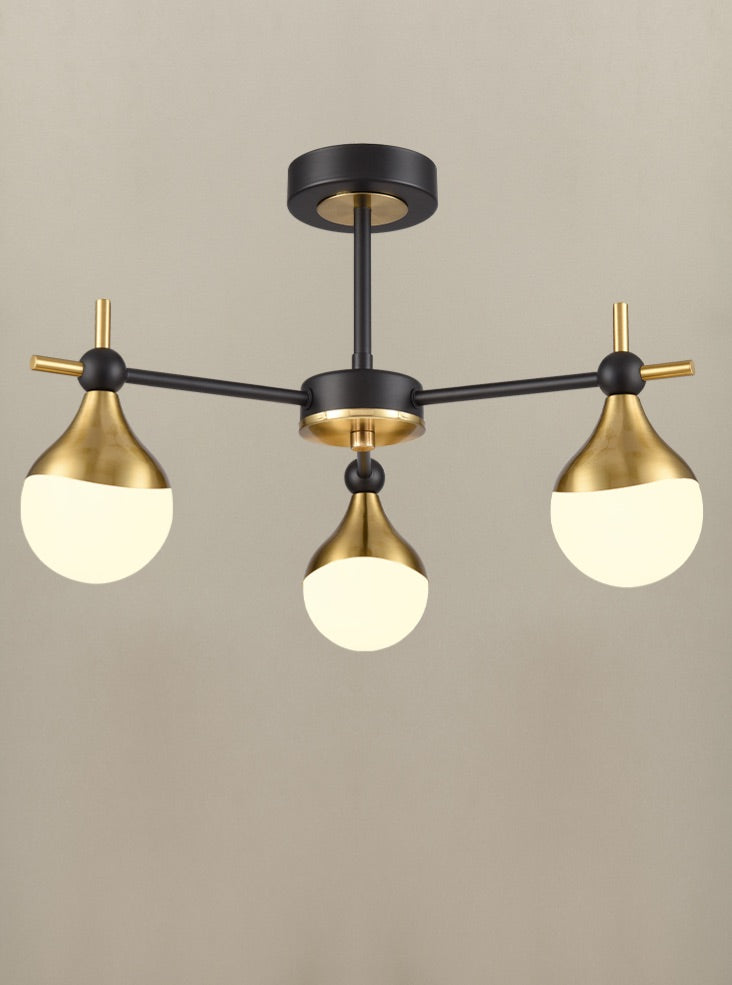 A three brushed gold and opaque glass globe light.&nbsp; Semi-flush on a back and gold metal fixture creating stunning mix of colours for both contemporary and classic settings.  W: 45 cm&nbsp; H: 29 cm  Requires 3 x G9 Bulbs.