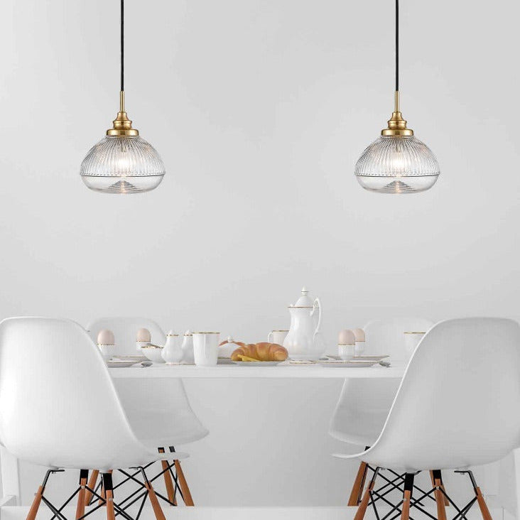 A ribbed glass pendant on beautifully designed brushed brass fittings. Perfect hallways, living room or kitchen light.