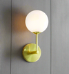 Brushed gold wall light with opal shade, clean simple look for your wall unobtrusively adding a warm glow to your walls, by your bed, in your living room or wherever you need that extra subtle light