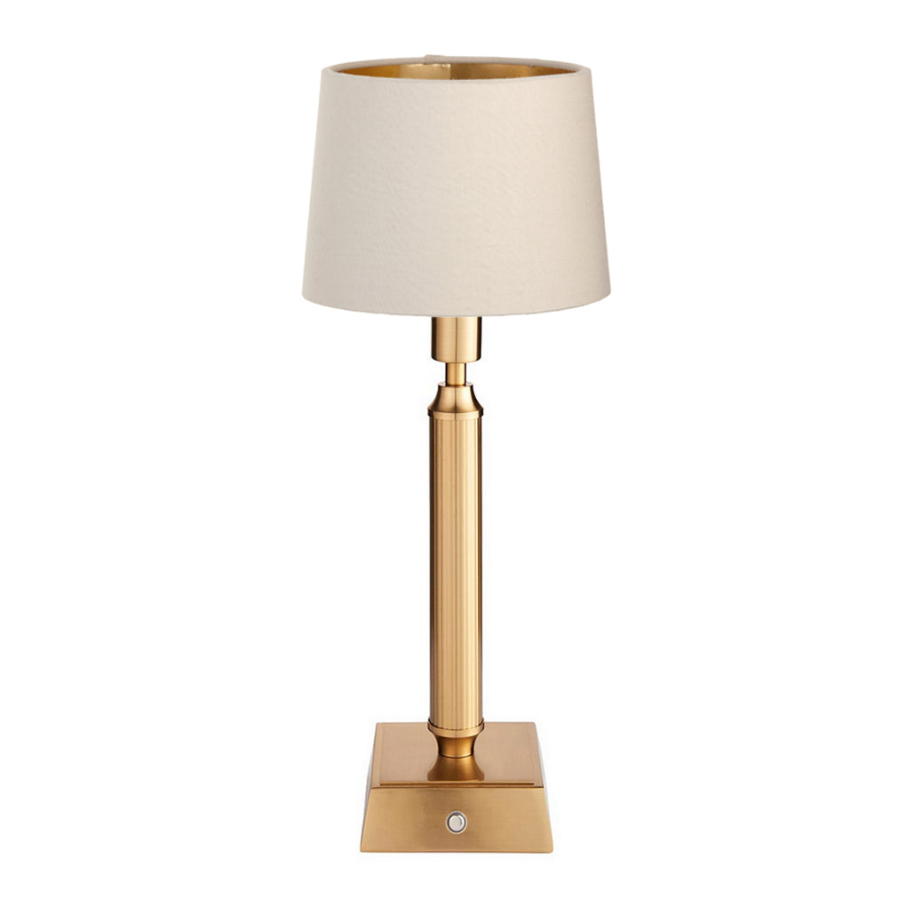 Brushed gold, rechargeable table lamp with a USB port. This portable, rechargeable 3 stage touch dimmer table lamp allows you to set your desired level of light. 