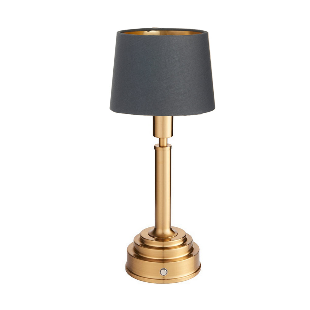 Brushed gold, rechargeable table lamp with a USB port. This portable, rechargeable 3 stage touch dimmer table lamp