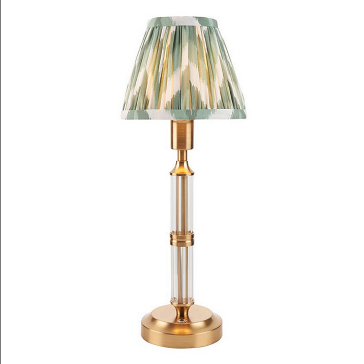 Brushed gold, rechargeable table lamp with a USB port.&nbsp; This portable, rechargeable 3 stage touch dimmer table lamp allows you to set your desired level of light.
They include a USB cable and an integrated warm white LED bulb.
These lamps are so convenient, can be placed wherever needed, no wires or plugs. Perfect for dining tables, desks or bedrooms. Can even be used outdoors making this a totally versatile lighting solution for your home.
Combine them with a beautiful pleated clip shade in three diff