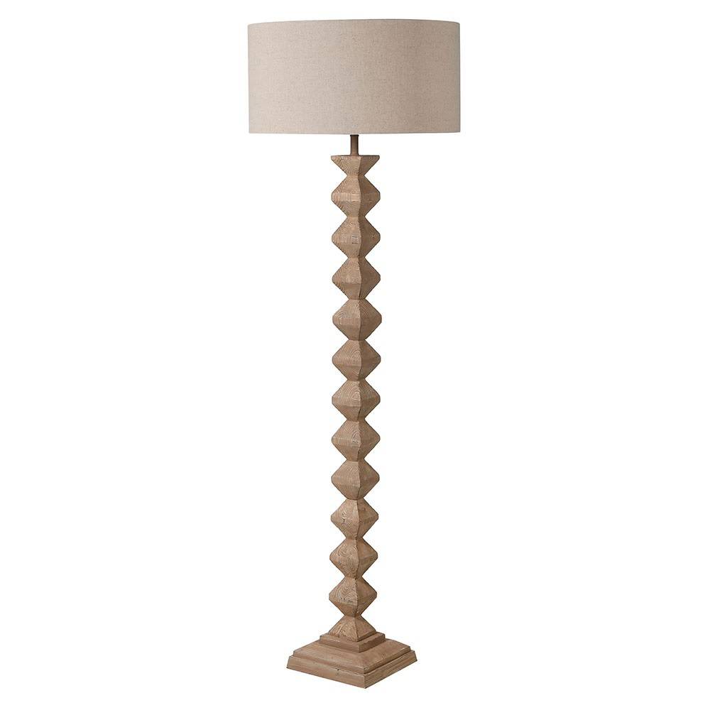 A really interesting notched, carved wooden floor lamp base, perfectly matched with a round linen shade of similar colour. Perfect neutral colour to blend in any interior. 