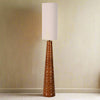 Tall, caramel coloured ribbed ceramic floor lamp in a cone shape with a matching tall funnel shaped shade in a linen colour. Definitely for the contemporary or mid-century style home. Exceptionally stylish shade and the base has a slightly rustic edge to the toffee coloured ceramic base.&nbsp; Beautifully finished a real statment light to add interest to your living room, hall, dining room anywhere you want to add light.