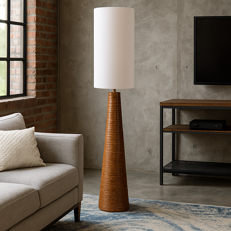 Tall, caramel coloured ribbed ceramic floor lamp in a cone shape with a matching tall funnel shaped shade in a linen colour. Definitely for the contemporary or mid-century style home. Exceptionally stylish shade and the base has a slightly rustic edge to the toffee coloured ceramic base.&nbsp; Beautifully finished a real statment light to add interest to your living room, hall, dining room anywhere you want to add light.